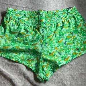 DSG mid rise‎ stride run short 3” inseam size XL. Green w/ gold &purple. NWT